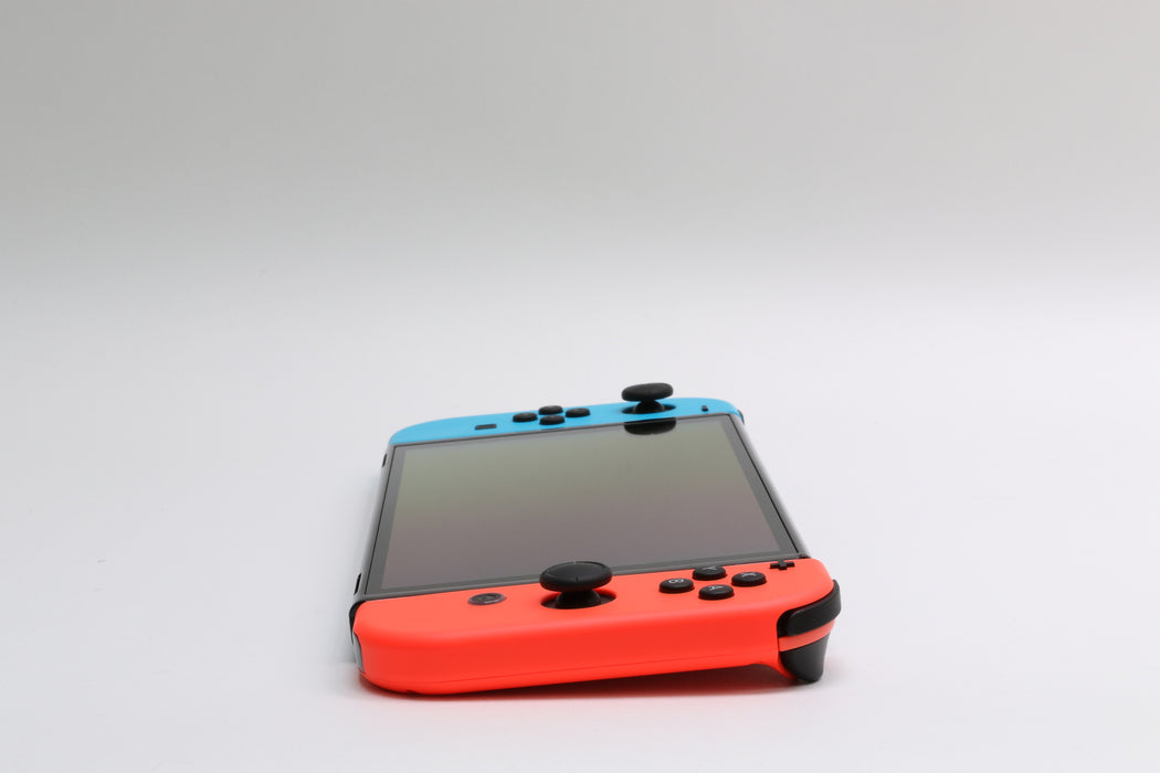 Brand New! Nintendo Switch OLED, Neon Red/Blue Joy-Cons, 64GB