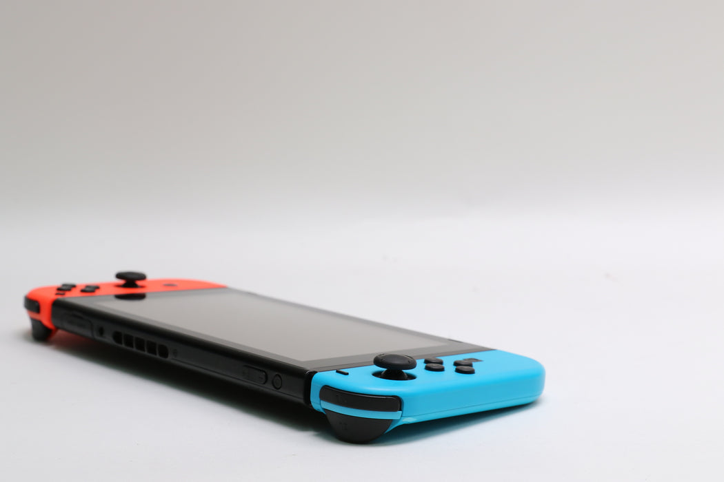 Nintendo Switch w/ Joy-Cons, Joy-Con Grip, and Dock