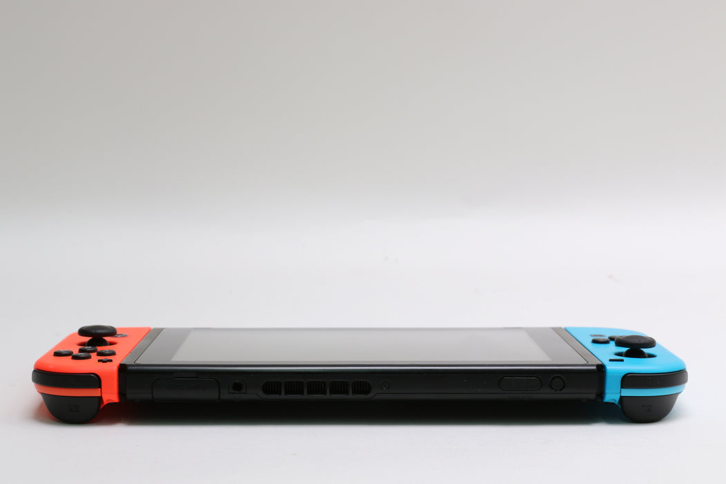 Nintendo Switch w/ Joy-Cons, Joy-Con Grip, and Dock