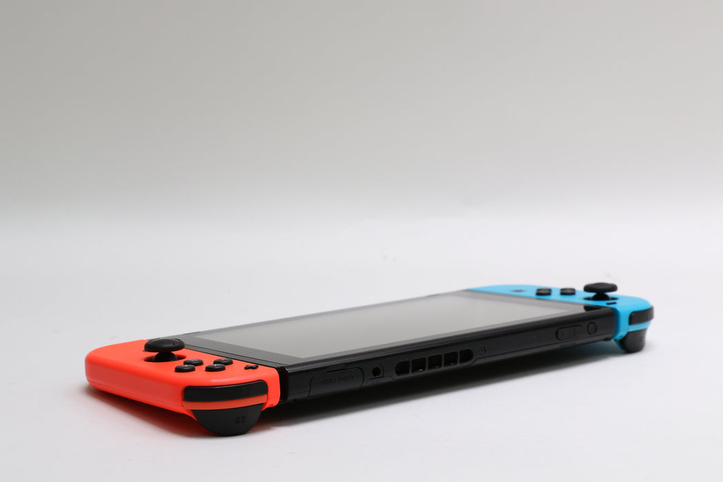 Nintendo Switch w/ Joy-Cons, Joy-Con Grip, and Dock