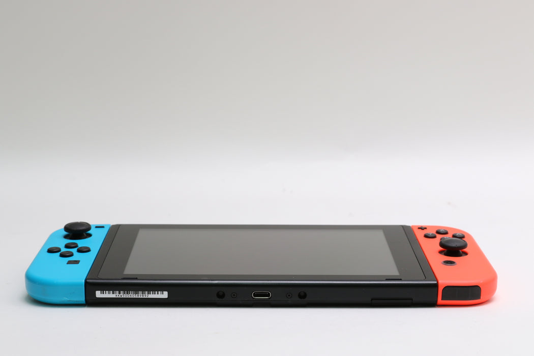 Nintendo Switch w/ Joy-Cons, Joy-Con Grip, and Dock