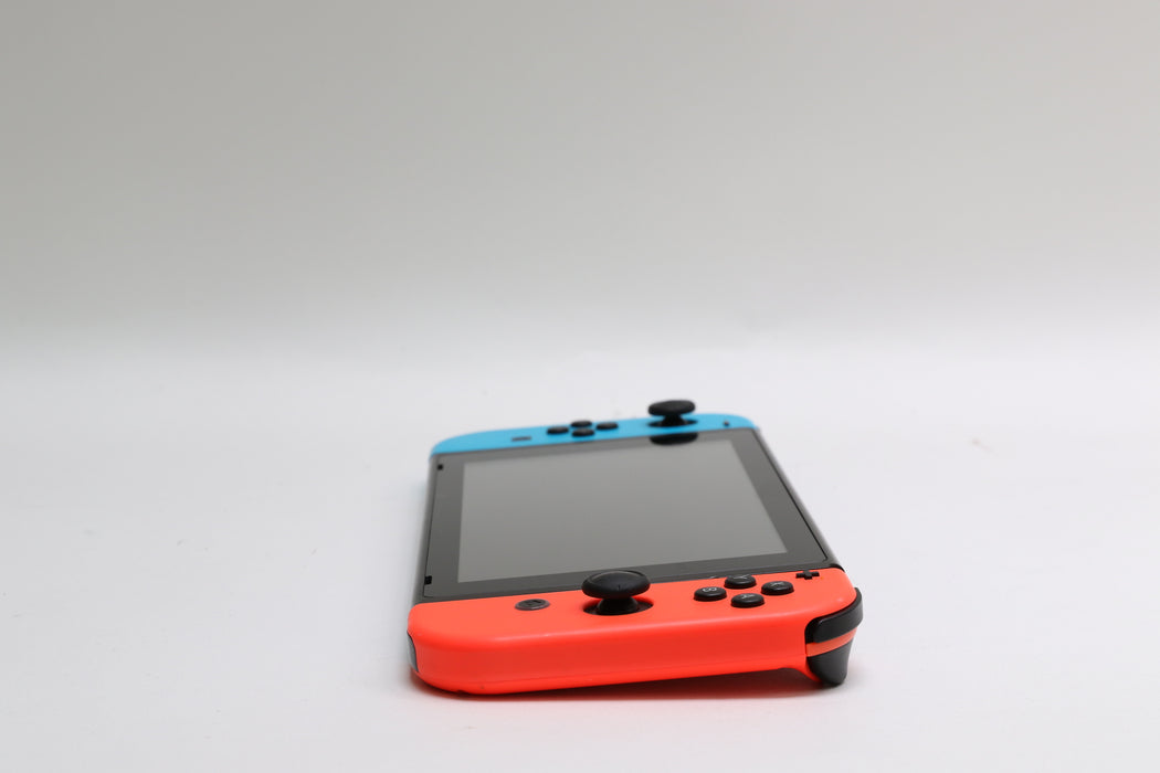 Nintendo Switch w/ Joy-Cons, Joy-Con Grip, and Dock