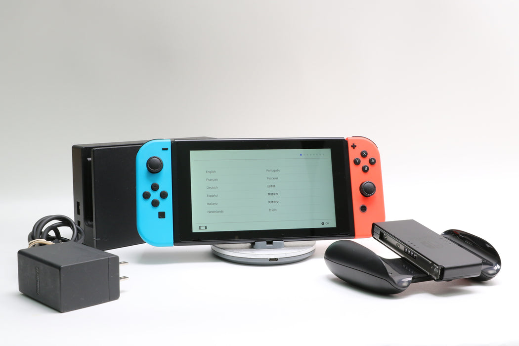 Nintendo Switch w/ Joy-Cons, Joy-Con Grip, and Dock
