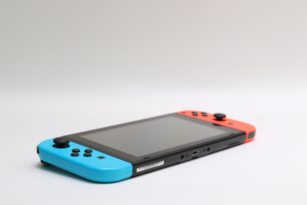 Nintendo Switch w/ Joy-Cons, Joy-Con Grip, and Dock